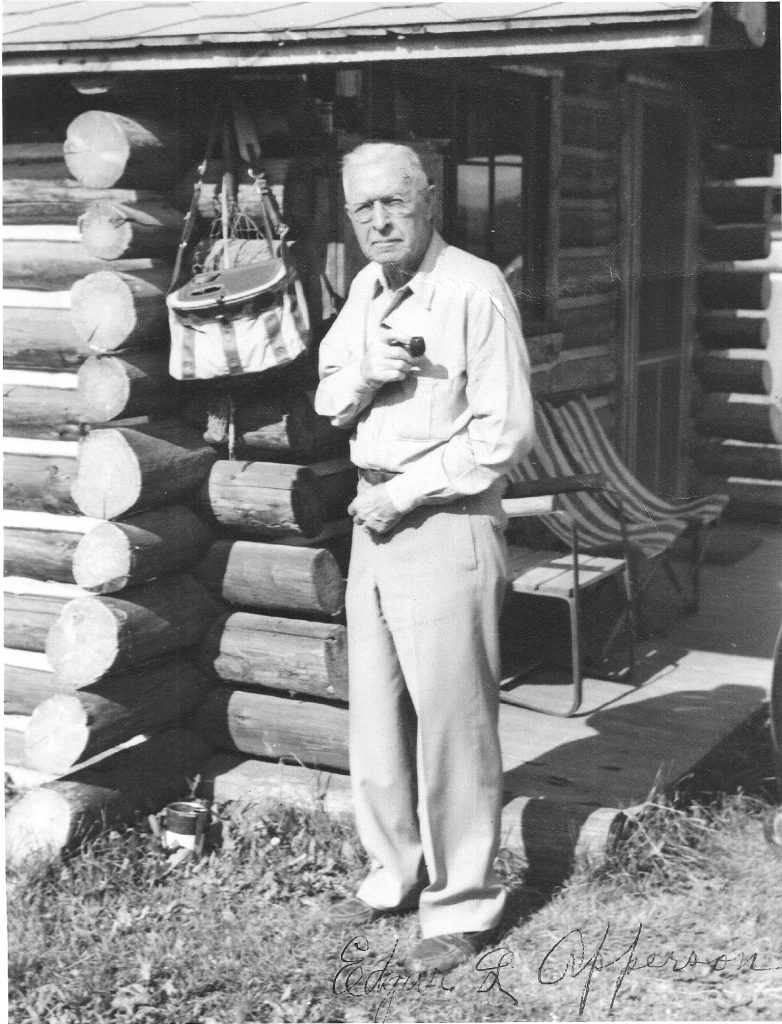 Edgar Apperson outside a cabin, believed to be Corral Lodge in Afton, Wyoming, circa 1951. Vladimir Nabokov and his wife Vera would stay there in 1952, chasing butterflies and recovering his health. He finished Lolita the following year; the story included a much older adult male passing off his younger sexual interest as his own child. Photograph with date notation held by the Elwood Haynes Museum, Kokomo, Indiana.